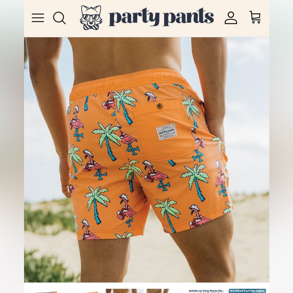 Orange swim trunks with pink flamingos